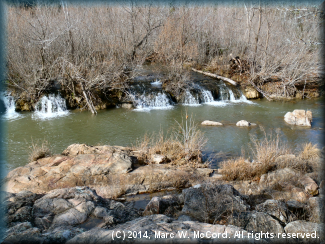 Looking upriver at another part of the same ledge below Hughes Crossing from river right