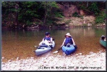 Terry watches Fraser coordinate the map to his GPS