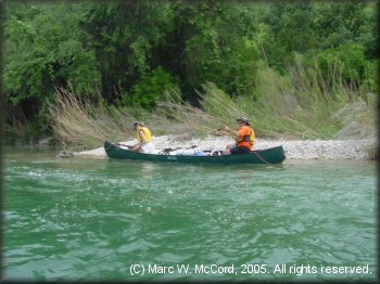Kathy and Gary Tupa skirting the right bank of the Devils River