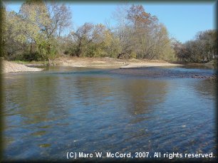 The Elk River forms at the confluence of Big Sugar and Little Sugar Creeks