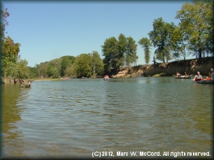 Canoeing the scenic Illinois River on a hot day