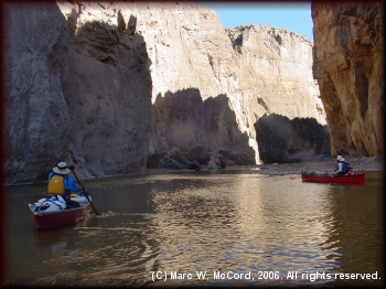 Gary Tupa (left) and Tom Taylor paddle into the canyon