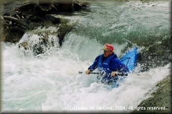 Steve McCarrick running the waterfall at 300 cfs